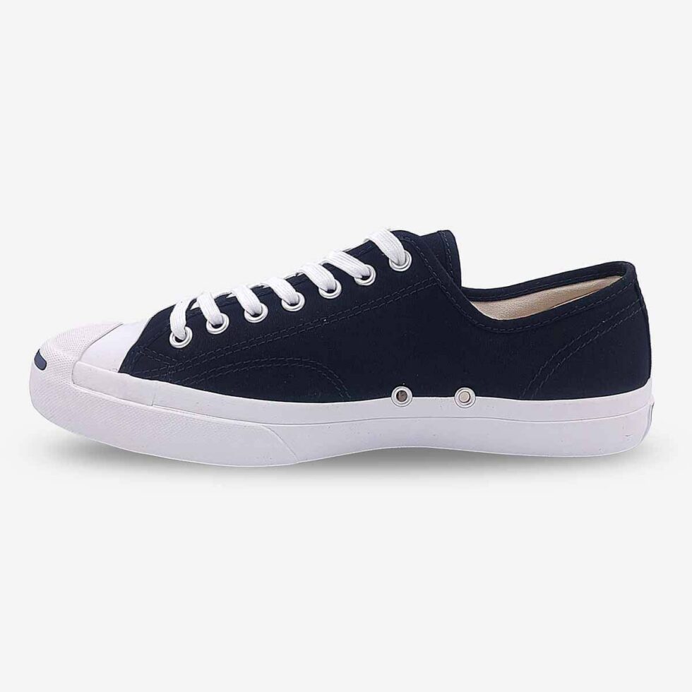 Inner side of Jack Purcell low black canvas sneaker in black with lace-up closure and blue sole