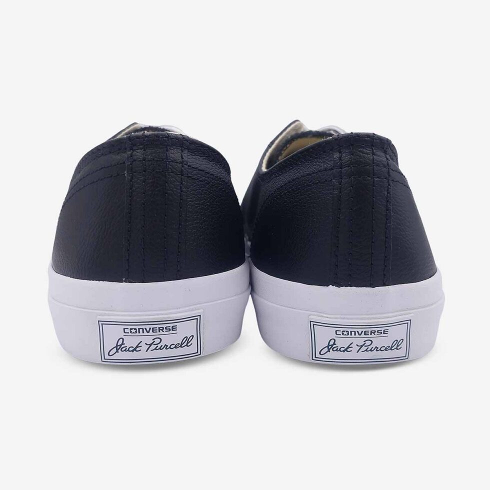 Back view of Jack Purcell low black leather sneaker showing heel branding in black leather