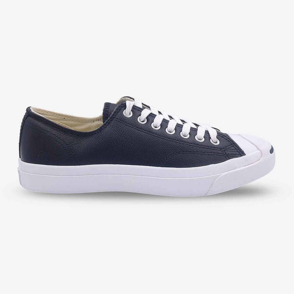 Side-front view of Jack Purcell low black leather sneaker showing low-profile silhouette and blue sole
