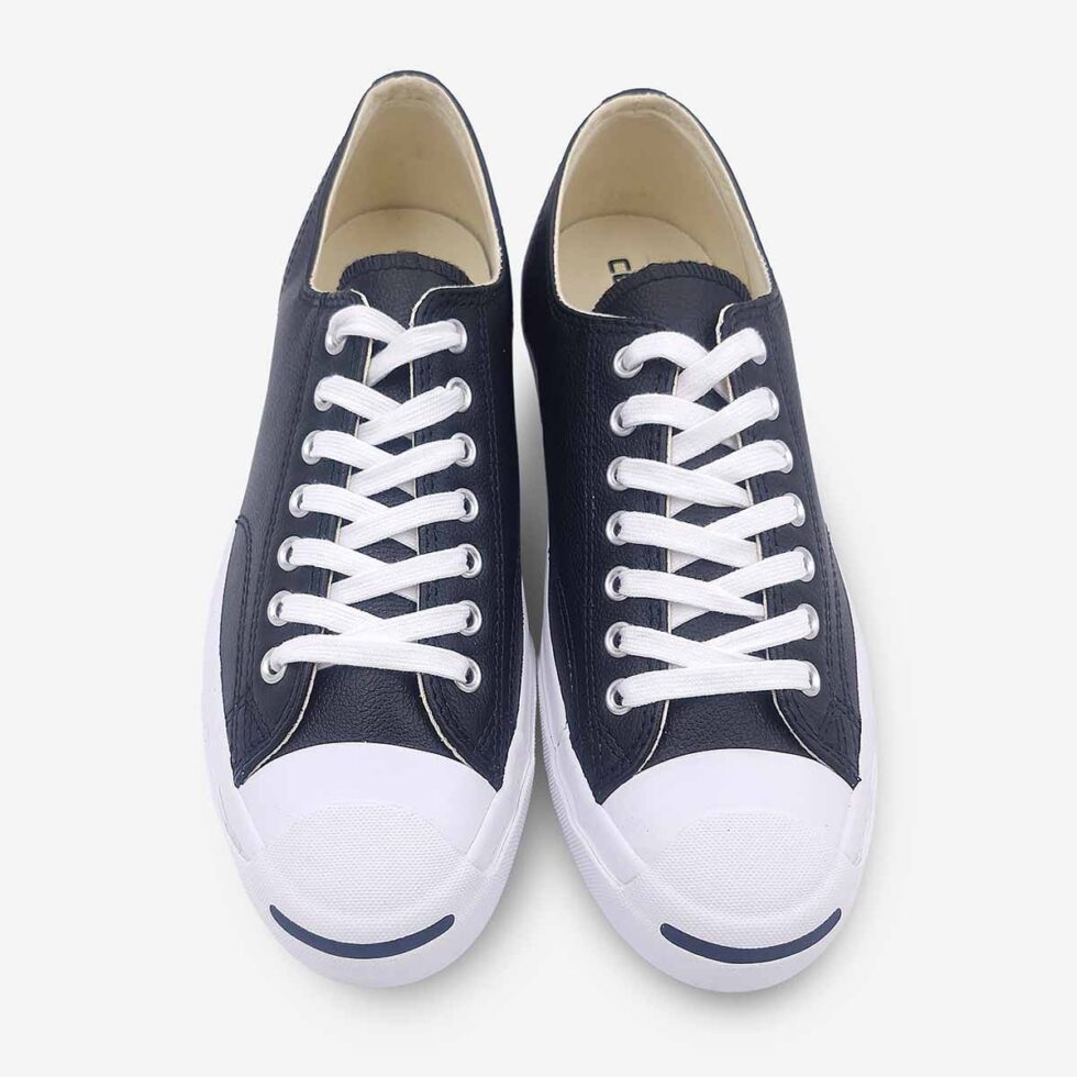 Top view of Jack Purcell low black leather sneaker in black showing lace-up closure