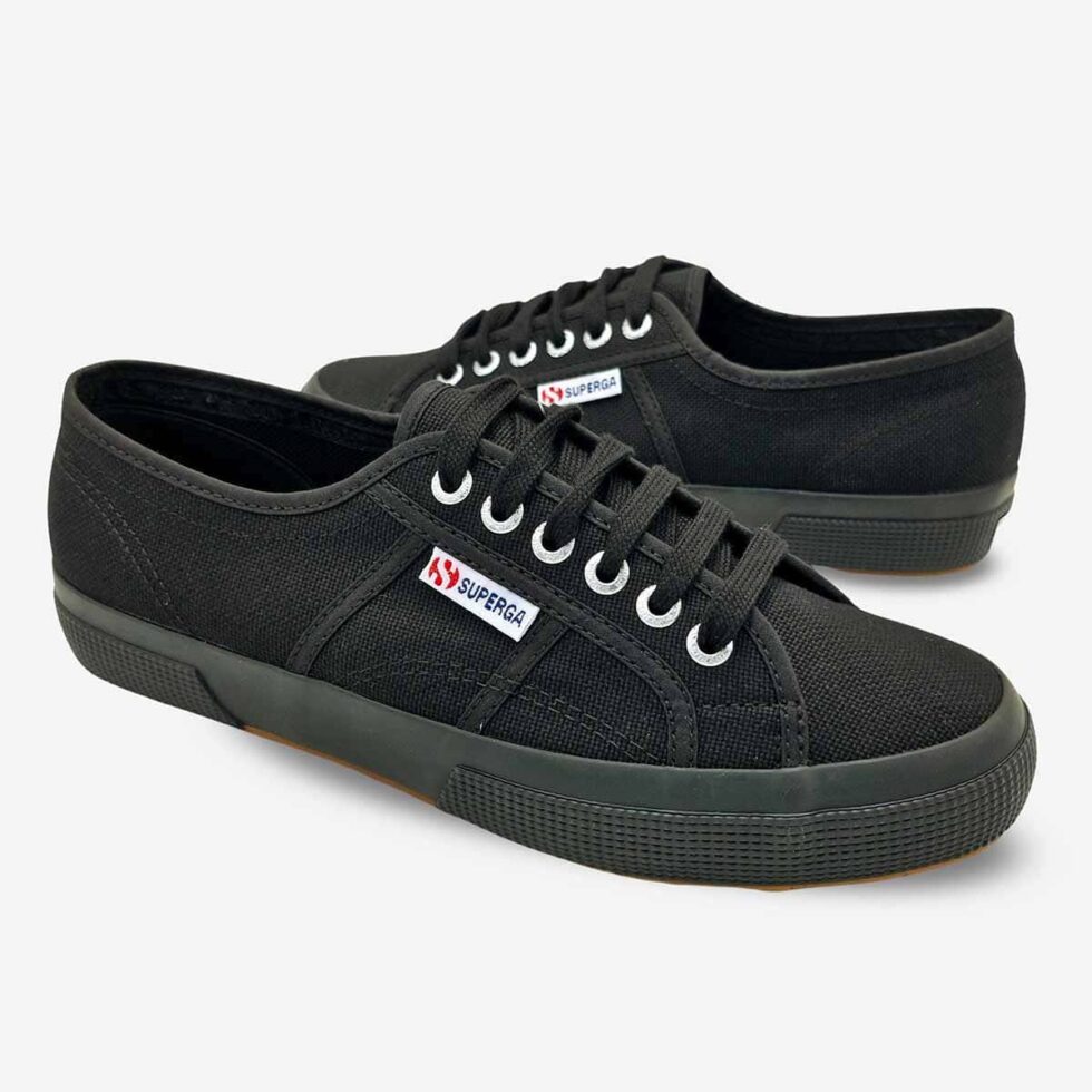 Superga 2750 Cotu full black low-cut sneakers, mirrored pair showing both shoes from opposite angles