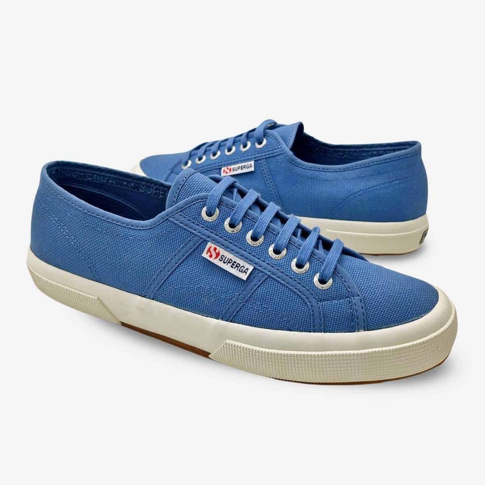 Superga 2750 Cotu sneakers in light blue, mirrored pair view showing both shoes