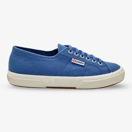 Superga 2750 Cotu low-top sneaker in light blue, side-front angle with visible Superga side tab