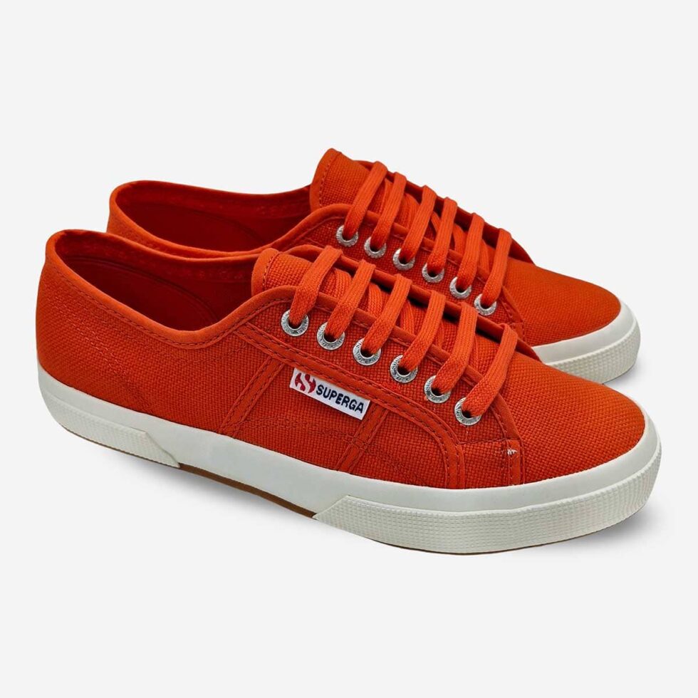 Pair of Superga 2750 Cotu Red Creta sneakers, angled view showing front and side profiles
