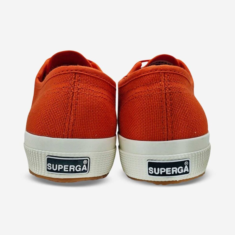 Rear view of Superga 2750 Cotu Red Creta sneaker showing heel structure and smooth red-orange canvas finish