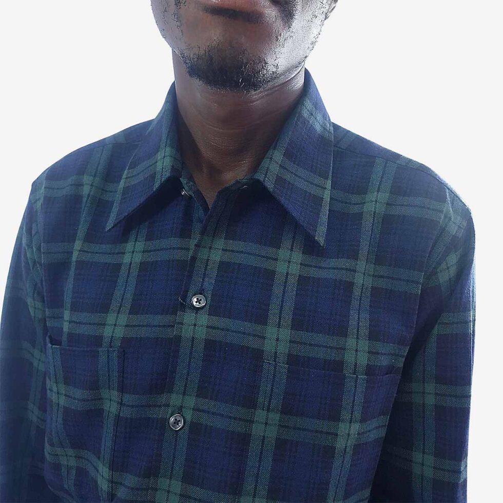 Close-up of Monatic Viyella green and blue check shirt showing flannel texture and stitching details
