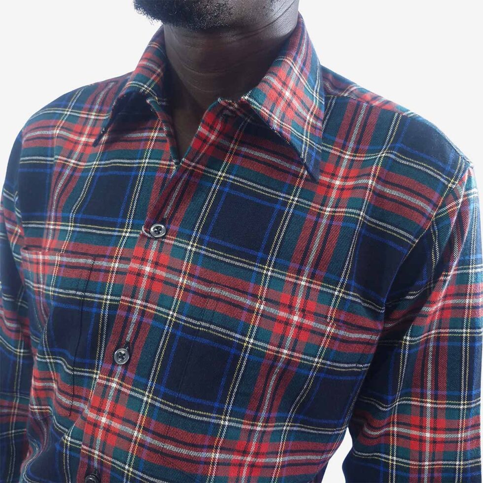 Close-up of Monatic Viyella navy, red, and green check shirt showing flannel texture and stitching