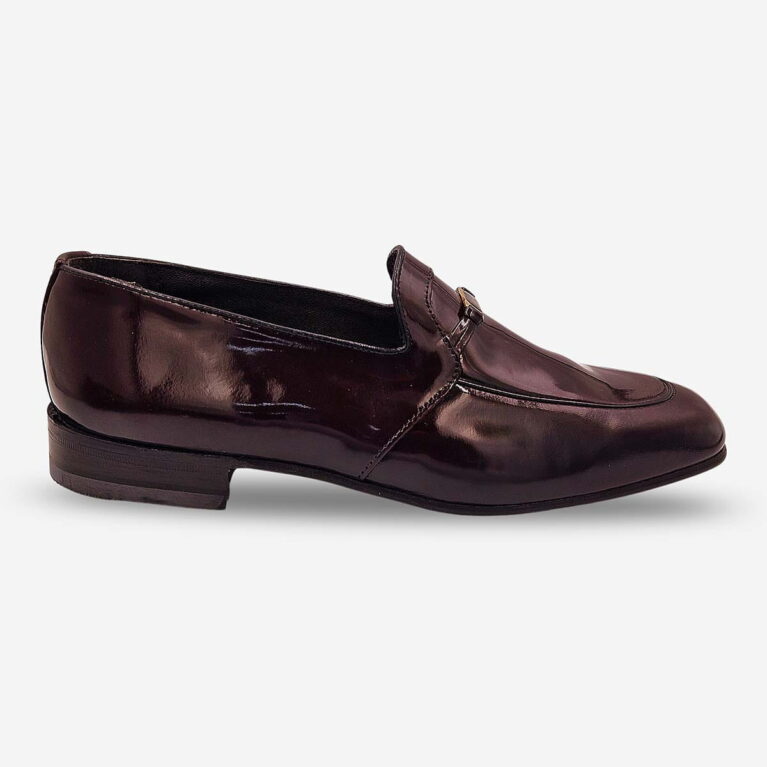 Side front angle of Barker Gemini burgundy shoe with metal bit detail.