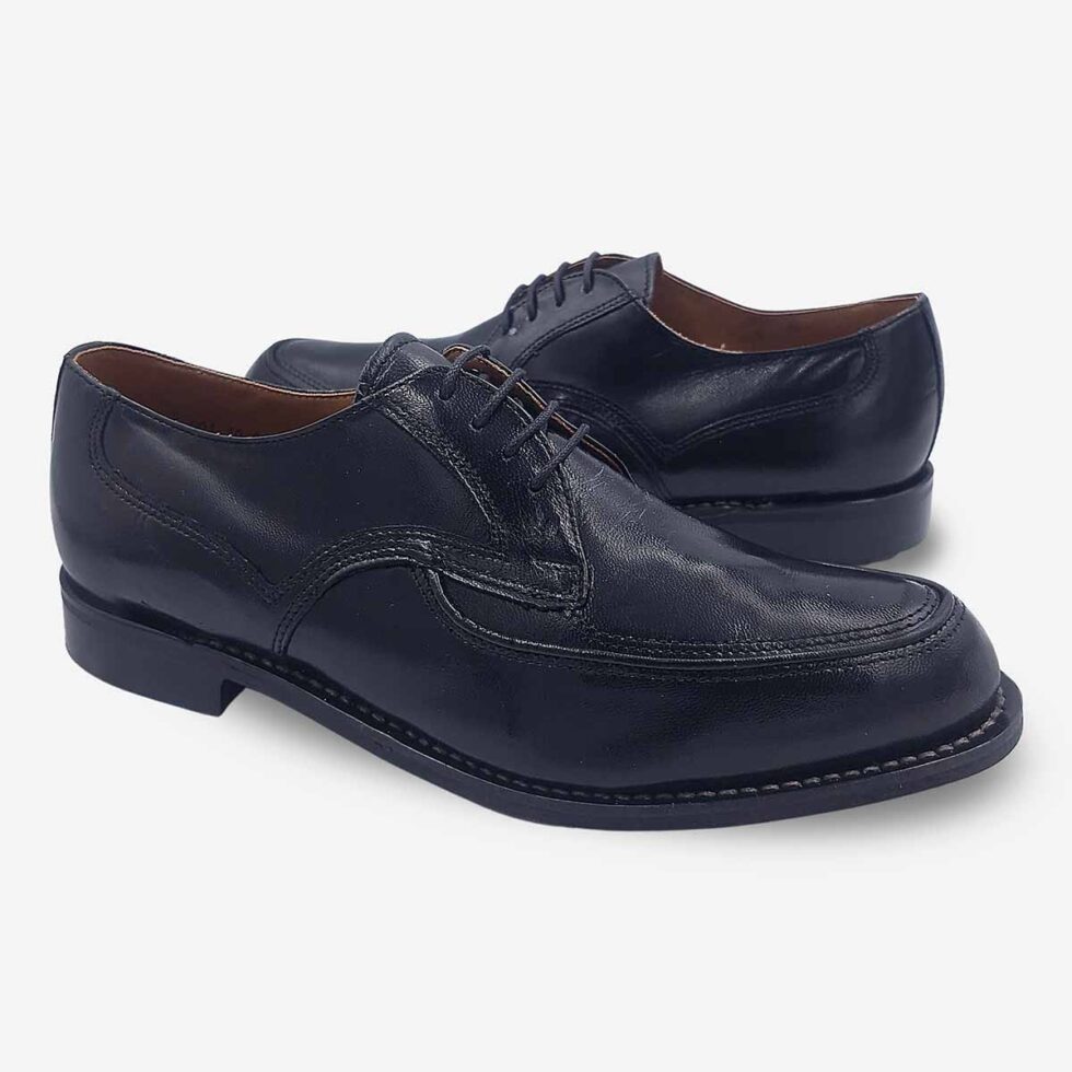 Mirrored pair of Bishop Derby shoes in black textured leather.