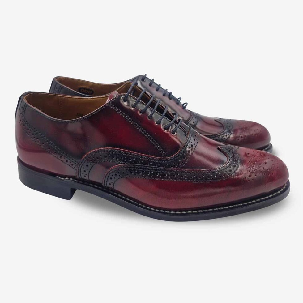 Angled pair of Bishop Burgundy Maroon Oxford Shoes with wingtip brogue patterning.