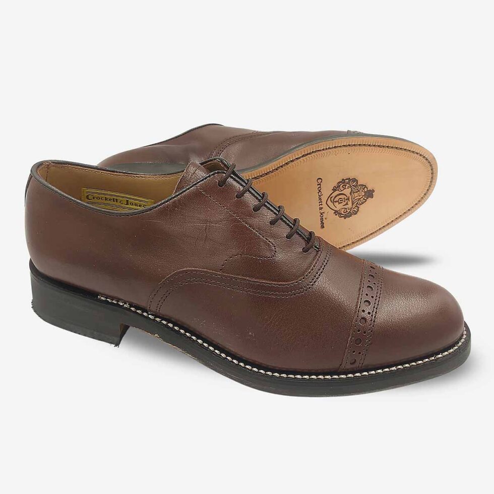 Crockett & Jones Oxford Top Cap Teak Brown Shoes angled showing leather soles