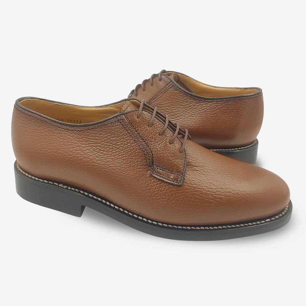 Mirrored view of Johnston & Murphy tan brown textured derby shoes