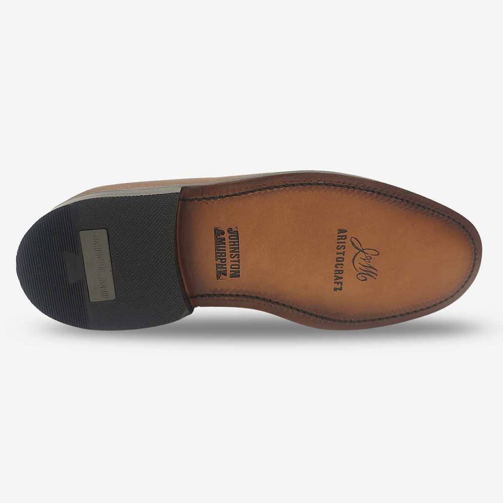 Underside of Johnston & Murphy tan brown derby shoes with leather sole