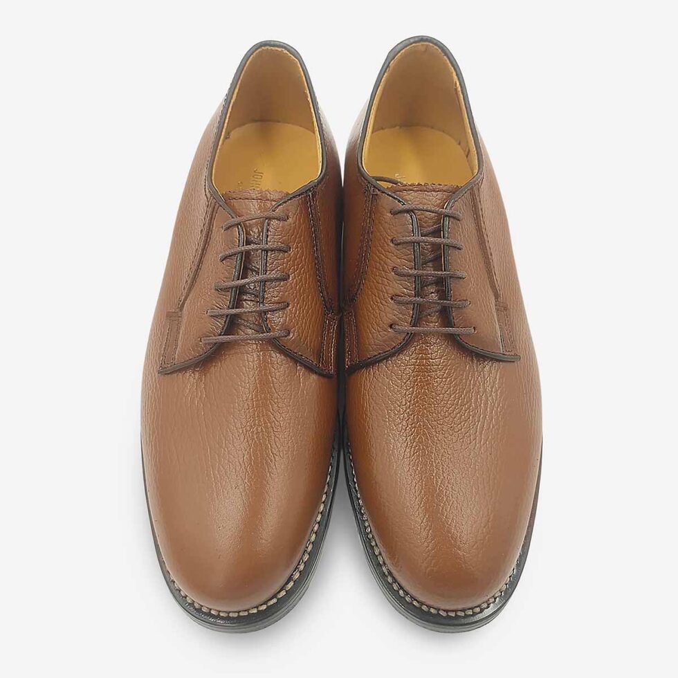 Top view of Johnston & Murphy tan brown textured leather derby
