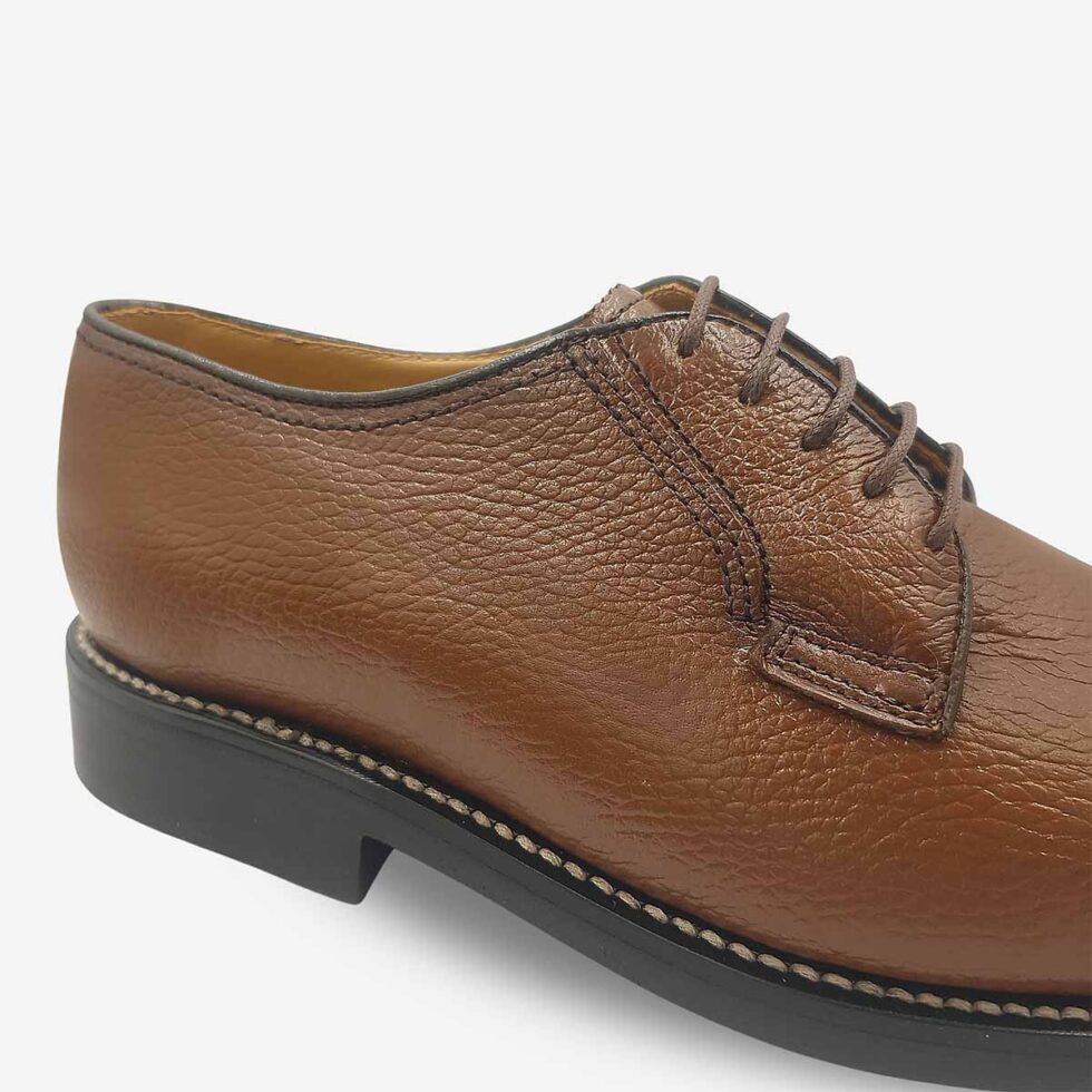 Johnston & Murphy tan brown textured leather derby shoe close-up