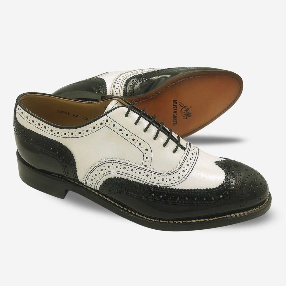 Johnston & Murphy black and white oxford shoes showing leather sole