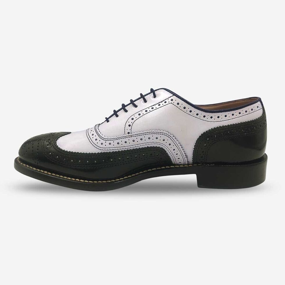 Inner side of Johnston & Murphy black and white oxford wingtip brogue