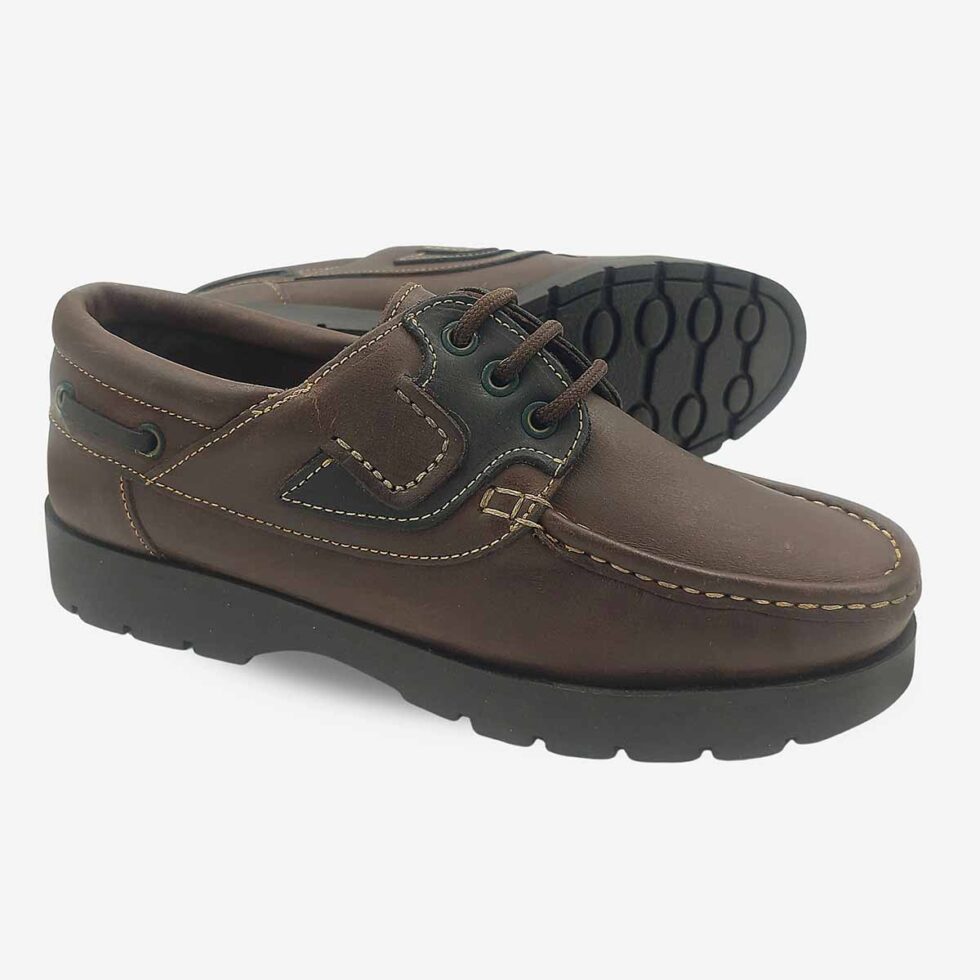 Angled view showing soles of Newport Seaman Rodeo Brown Black Shoes.