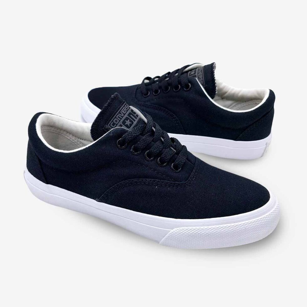 Mirrored pair of Converse Skidgrip black low-top sneakers in canvas finish