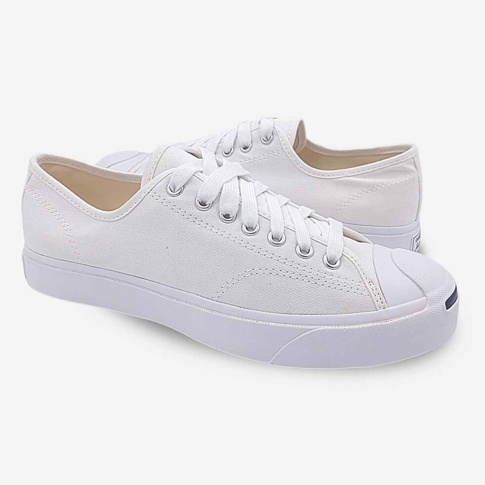 Mirrored pair of Jack Purcell low white canvas sneakers in all-white design