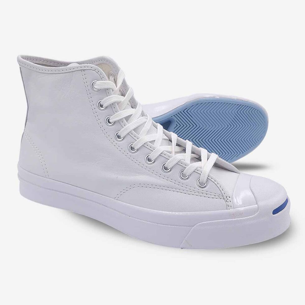 Side-bottom angle of Jack Purcell white leather boots with textured rubber outsole