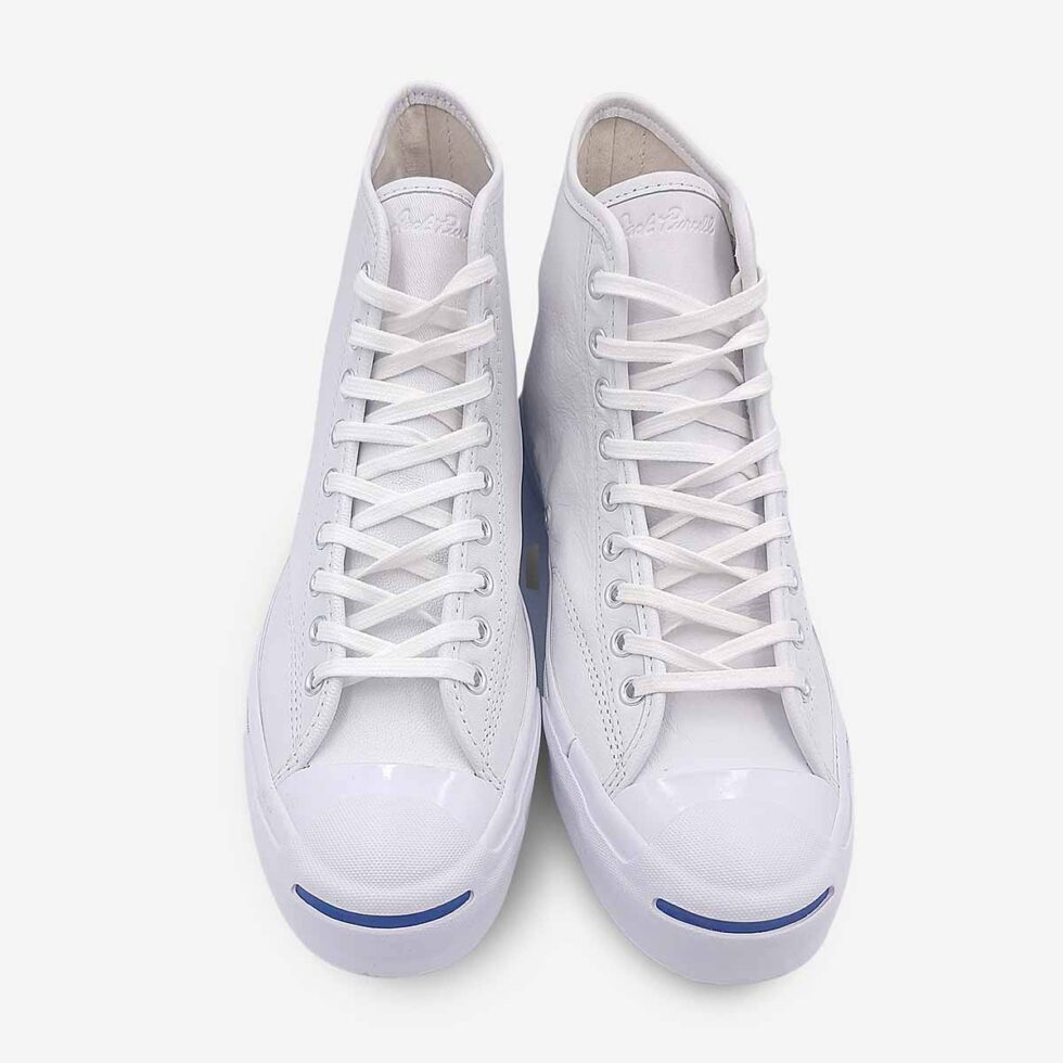 Top view of Jack Purcell white leather boots showing lace-up front and stitching