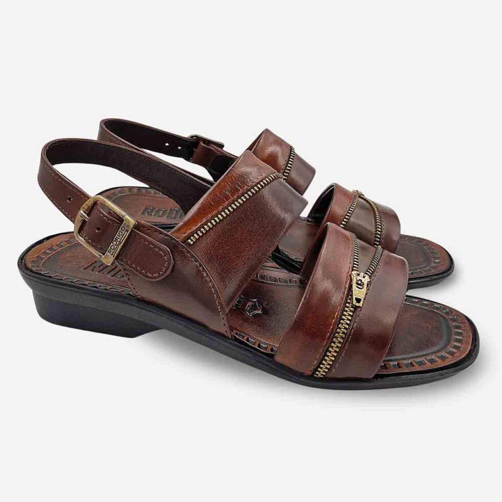 Angled Pair View of Rodrigo Open-Toe Sandals in Taupe showing wave straps with zip-pattern design and ventilated construction.