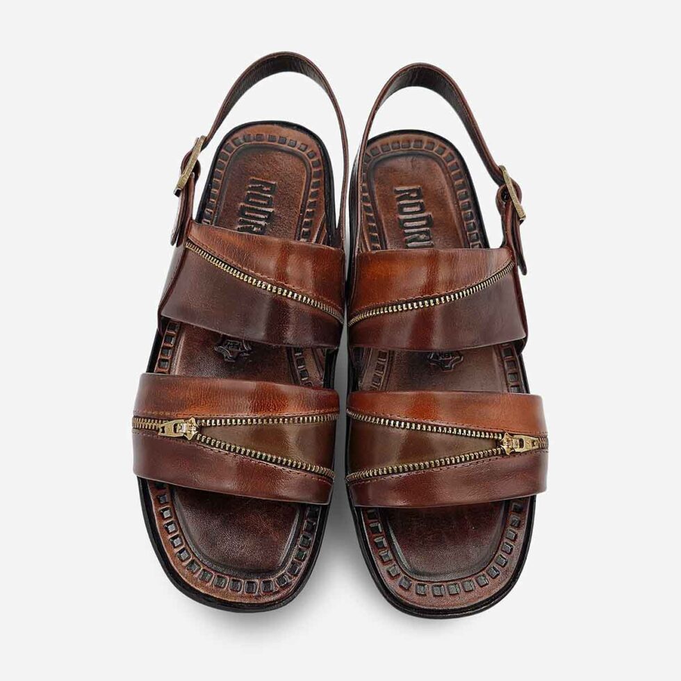 Top View of Rodrigo Open-Toe Sandals in Taupe with zip-patterned wave straps and adjustable buckle.