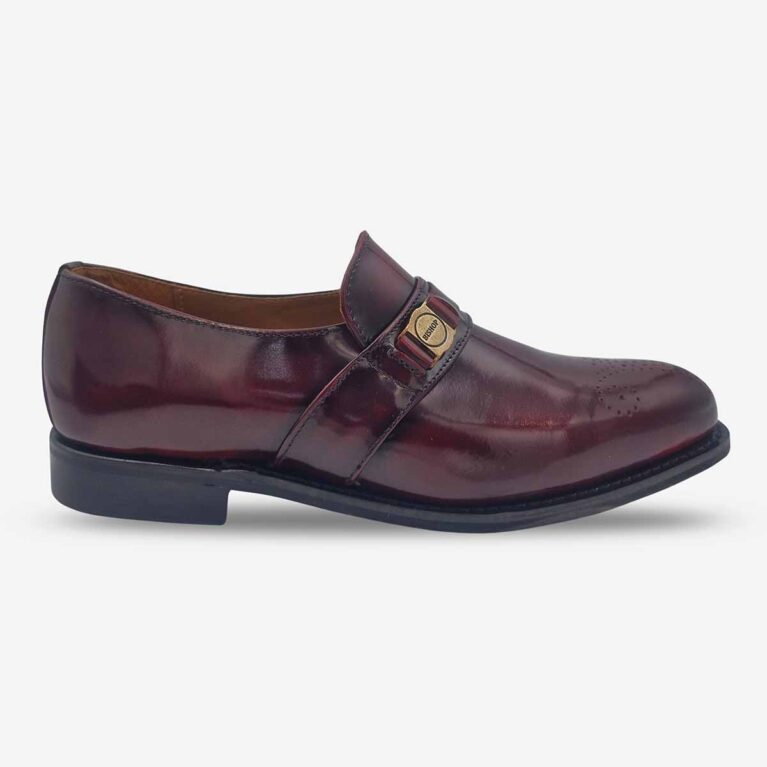 Side profile of Bishop Bit Loafer Shoes in burgundy leather with toe medallion.