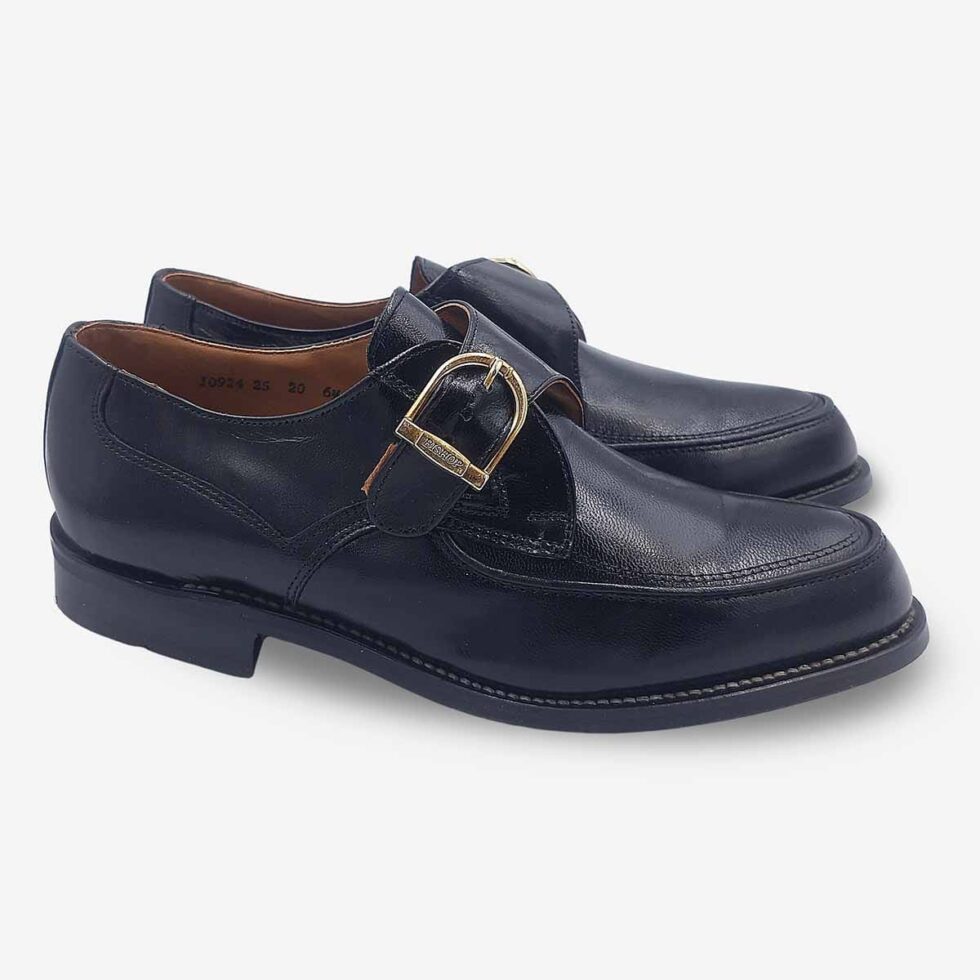 Angled pair view of Bishop Monk Strap shoes in textured black leather.