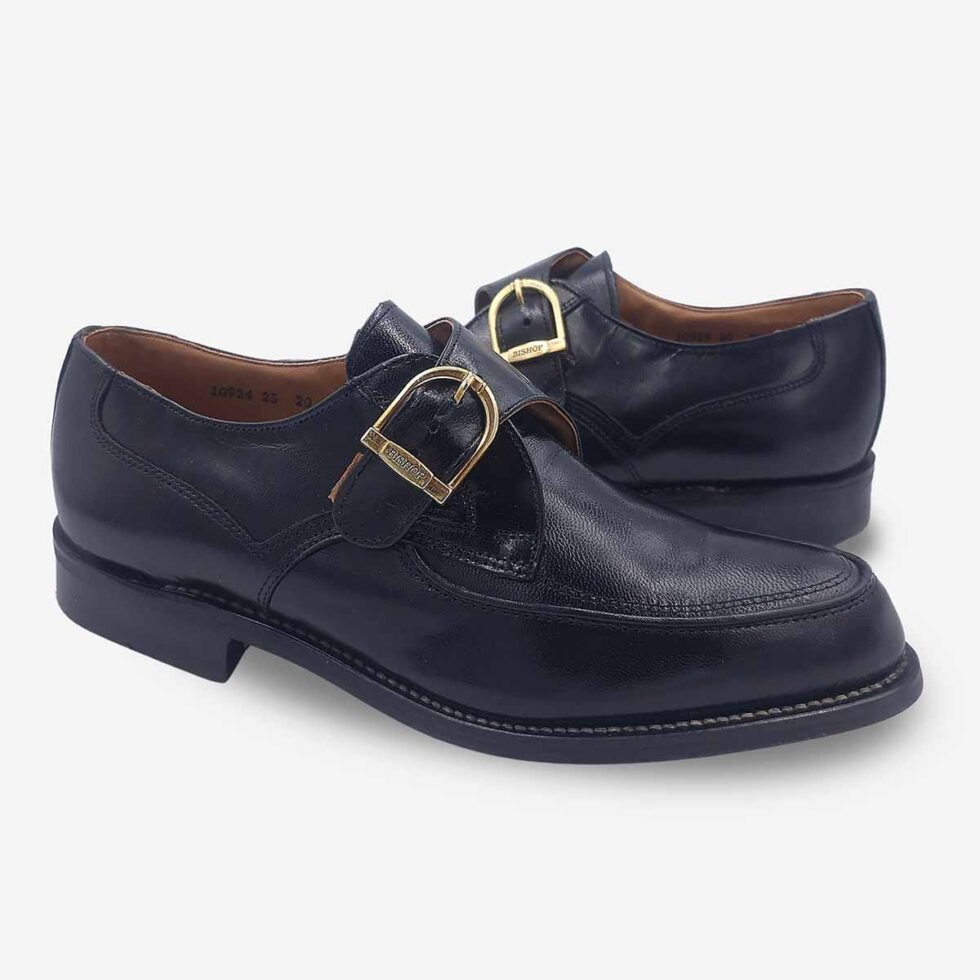 Mirrored pair of Bishop Monk Strap shoes in textured black leather.