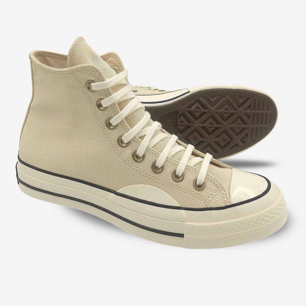 Angled pair showing sole of Converse Chuck 70 Premium Boots in cream white colour.