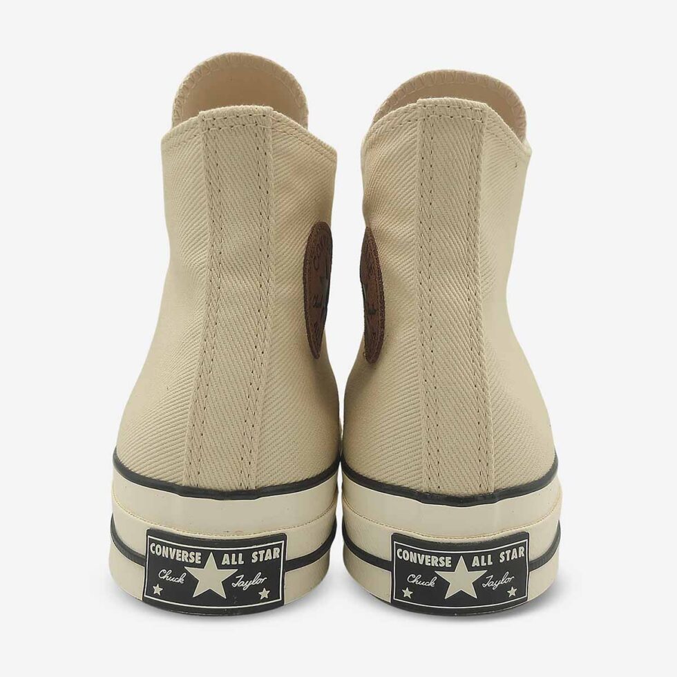 Rear view of Converse Chuck 70 high-tops in cream white colour showing heel “license plate”.