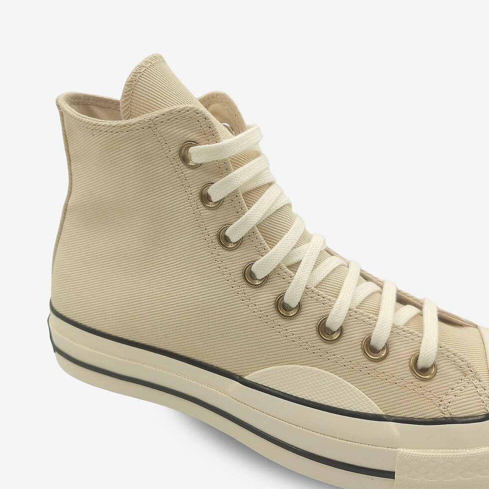 Close-up of Converse Chuck 70 high-top boots in cream white colour.