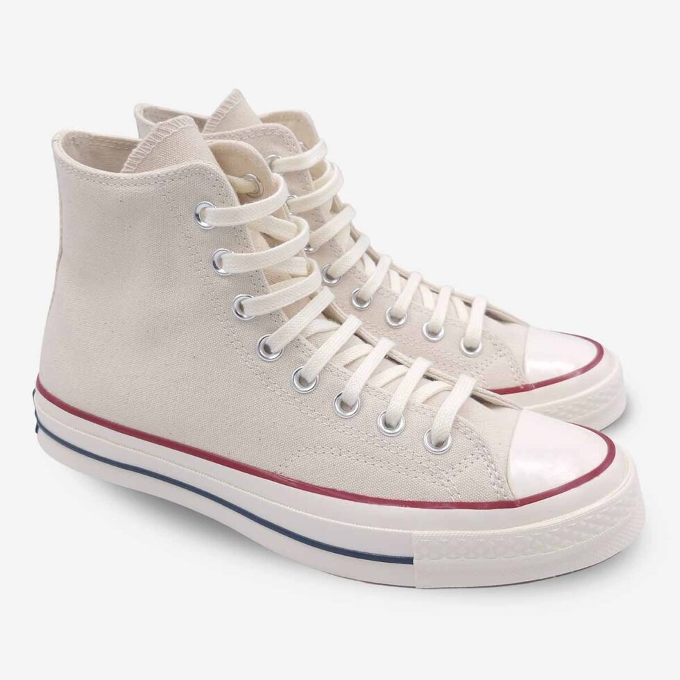 Angled pair of Converse Chuck 70 White Boots in Parchment colour.