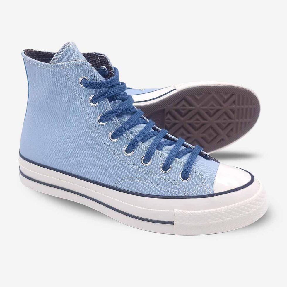 Angled pair showing sole of Converse Chuck 70 Sky Blue Boots in sky blue colour.