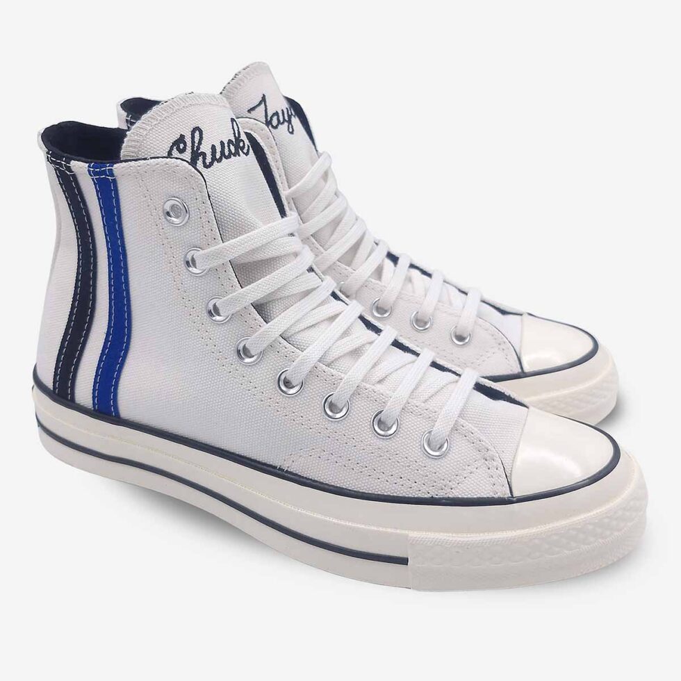 Angled apir view of Converse Chuck 70 high-top boots in vintage white colour.