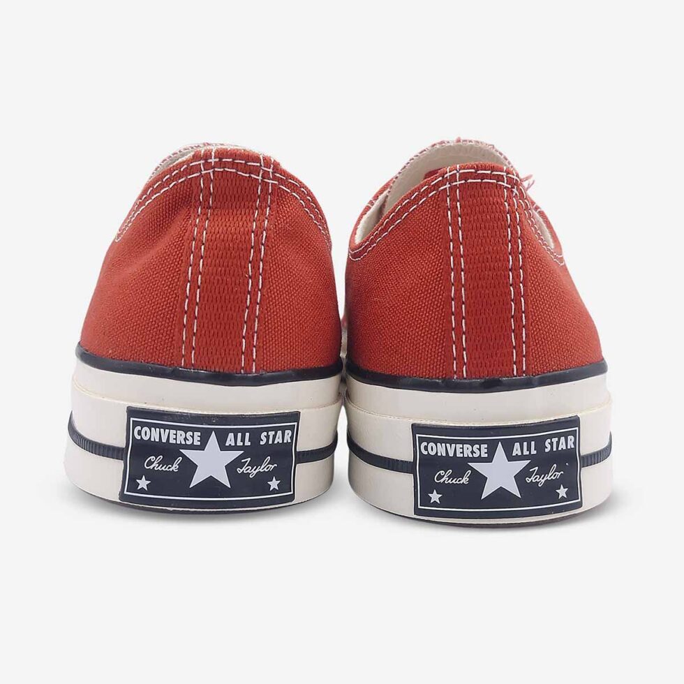 Back view of Converse Chuck 70 Low Red sneakers showing signature “license plate” on heel.
