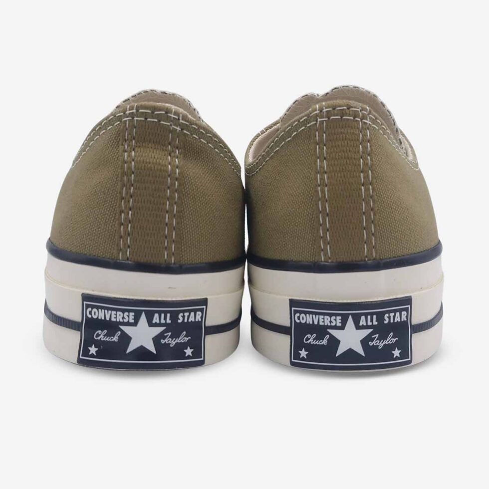 Back view of Converse Chuck 70 Low sneakers in a taupe brown colour showing signature “license plate” on heel.