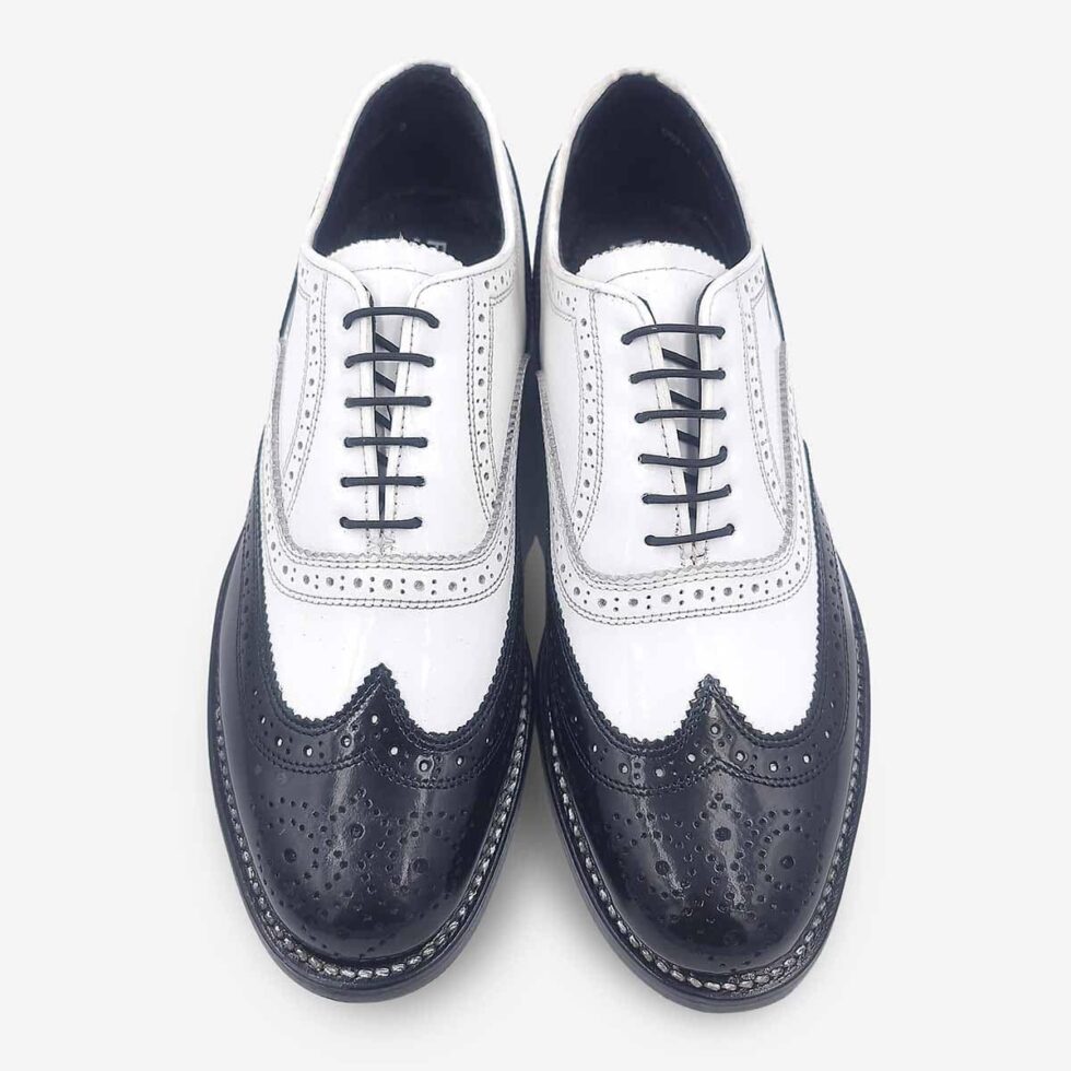 Top view of Florsheim Cobbler Wingtip Shoes in black and white.