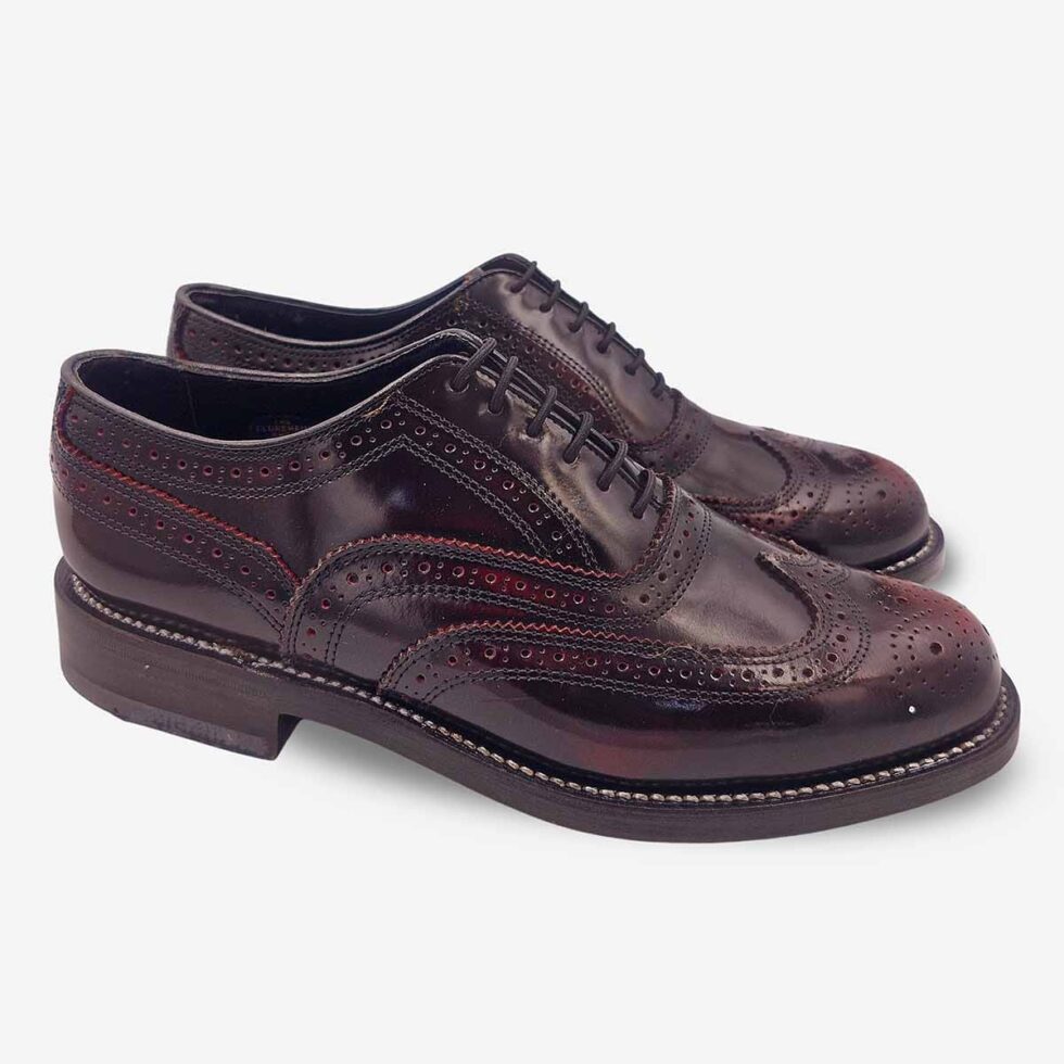 Angled view of Florsheim Cobbler Wingtip Shoes in burgundy.