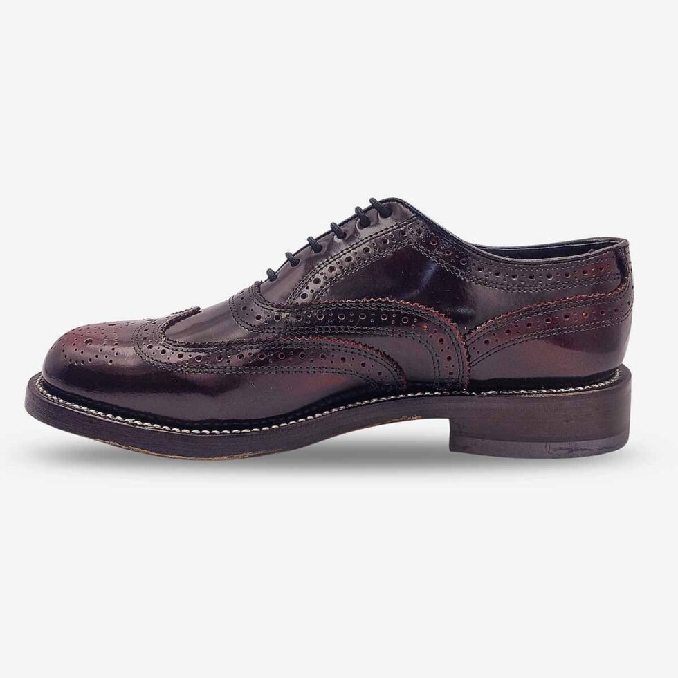 Inner side view of Florsheim Cobbler Wingtip Shoes in burgundy.