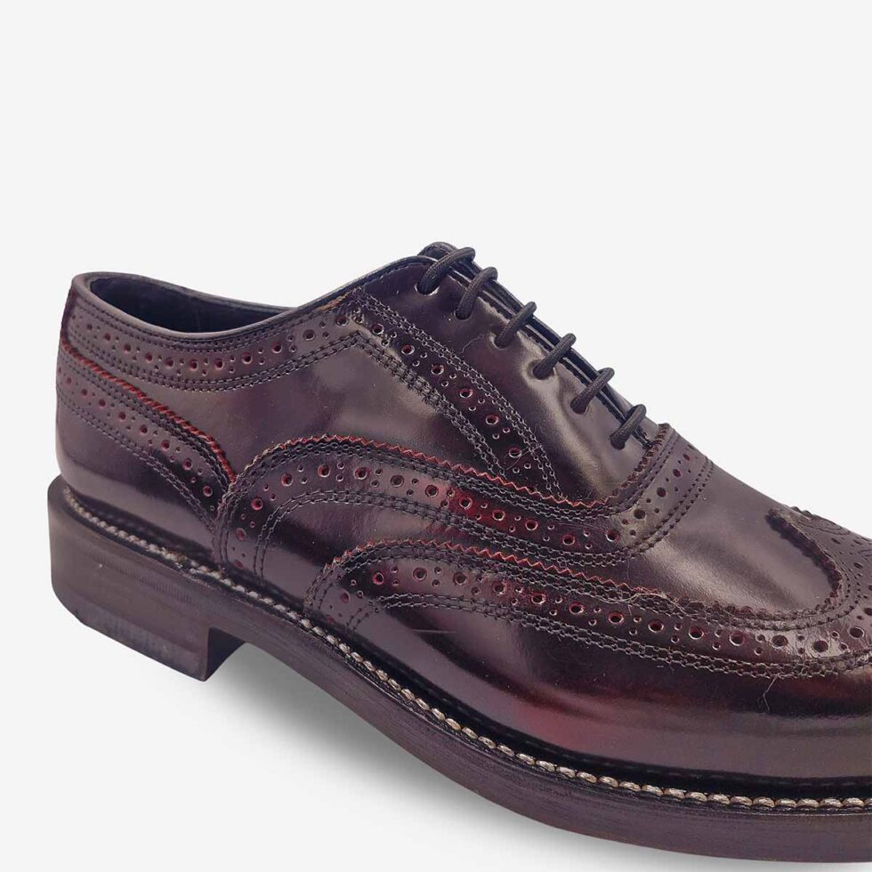 Close-up of Florsheim Cobbler Wingtip Shoes in burgundy.
