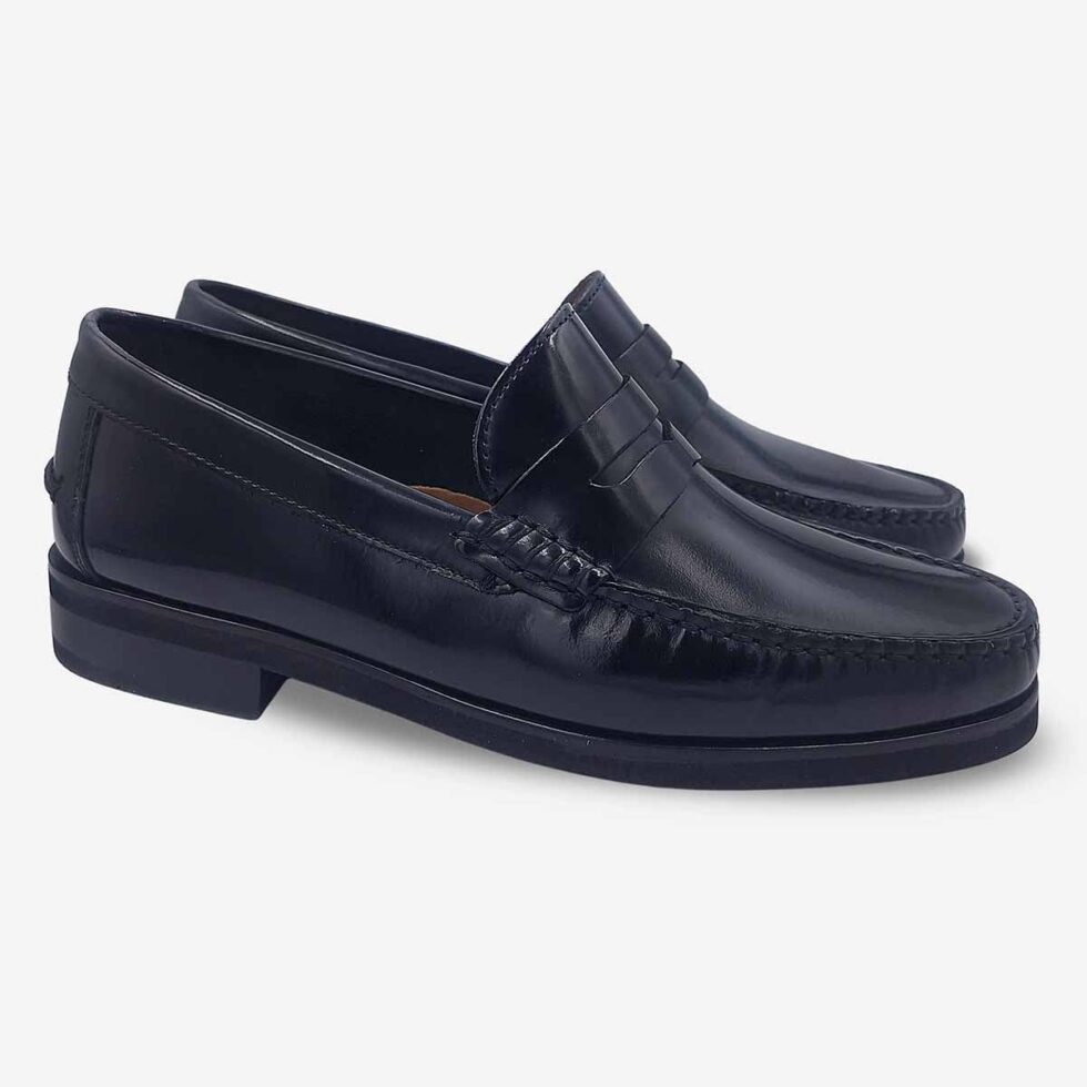 Angled pair of Florsheim Berkley Flex Black Moc Toe Loafers.