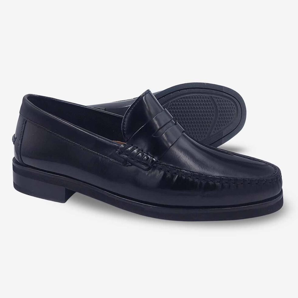 Angled view showing sole of Florsheim Berkley Flex Black Moccasins.