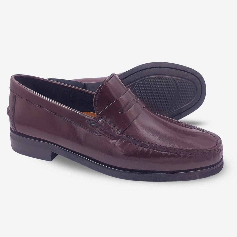 Angled view showing sole of Florsheim Berkley Flex Burgundy Moccasins.