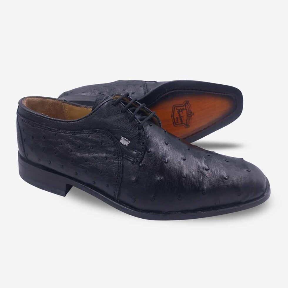 Angled pair showing sole of Florsheim Brandon Ostrich Black Shoes in black.