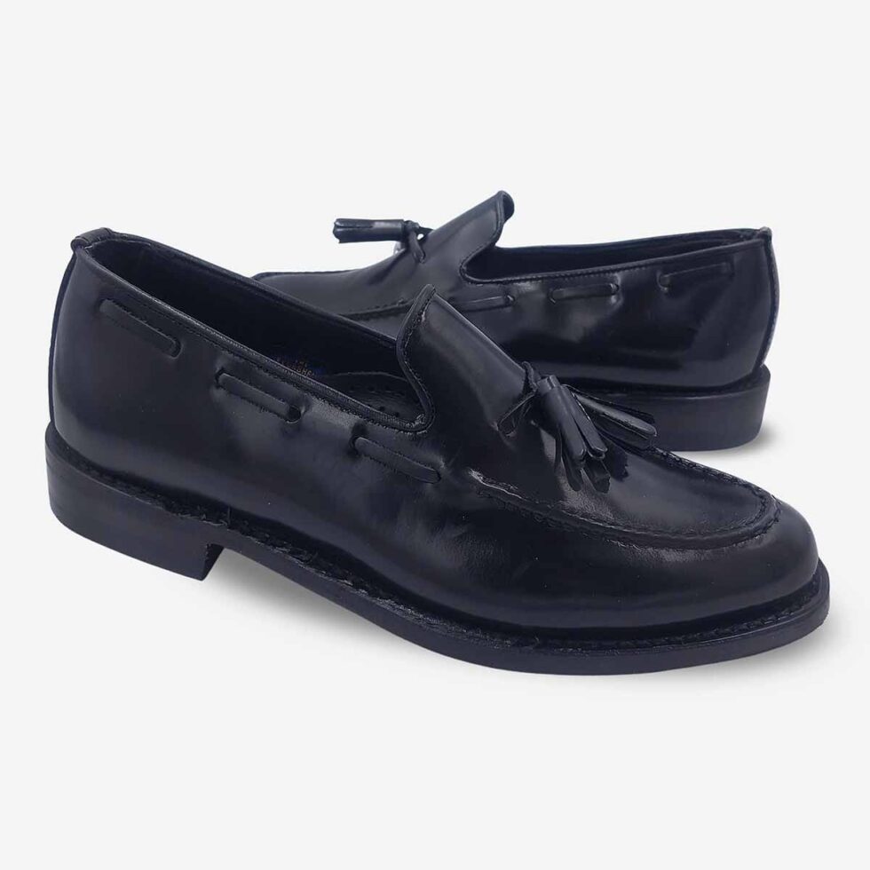 Mirrored pair of Florsheim Cobbler Tassel Loafers in Black.