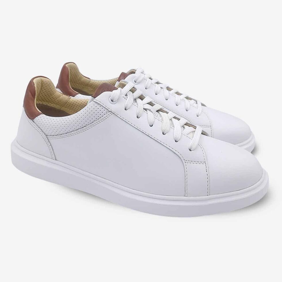 Angled pair of Florsheim Social White Sneakers.