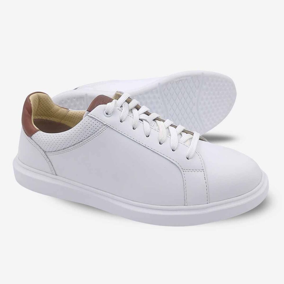 Angled view showing sole of Florsheim Social White Sneakers.